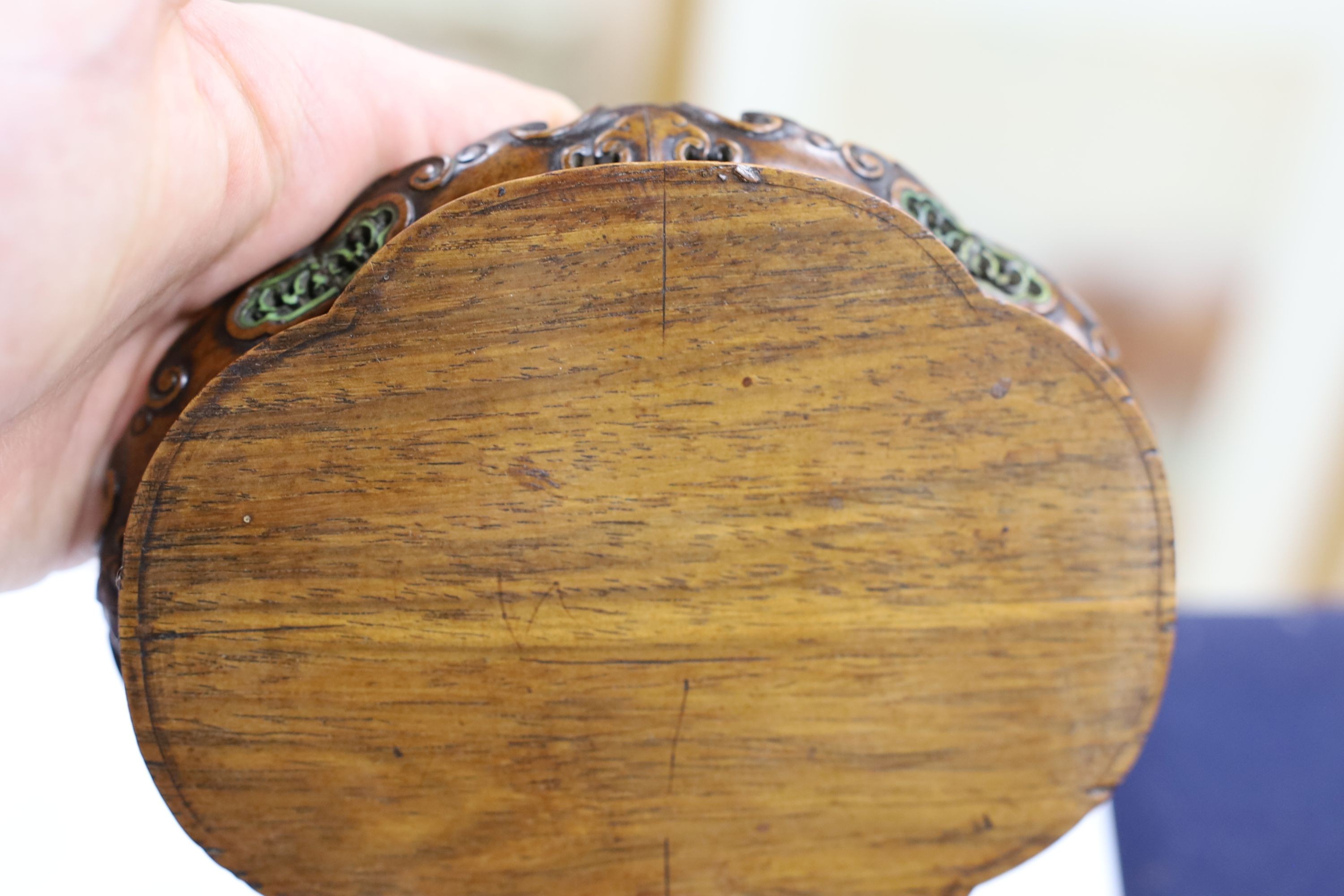 A fine Chinese oval hardwood and green stained Ivory inset stand, Qing dynasty, lacking stretcher, 15 cms wide.